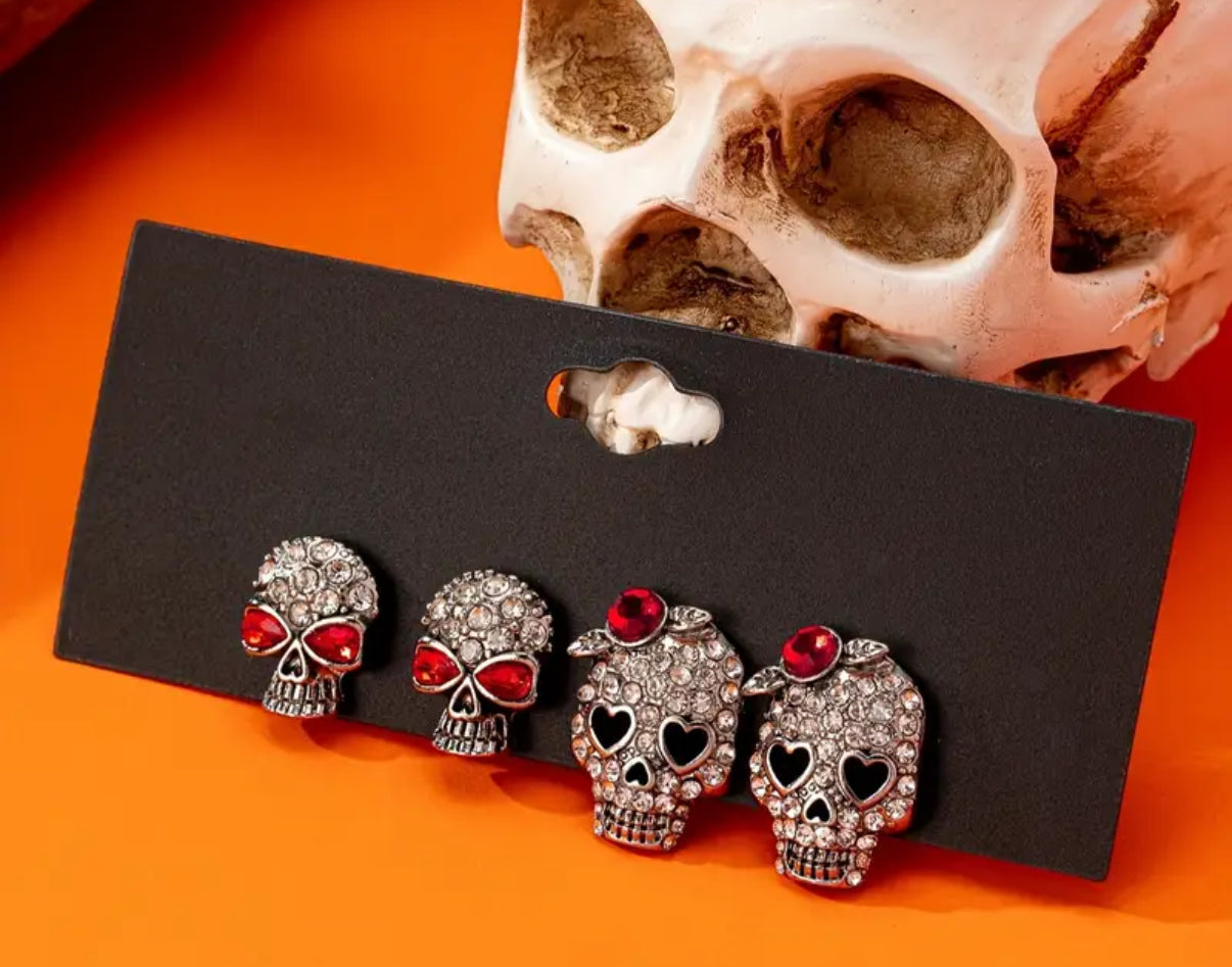 2 pairs skull earrings
