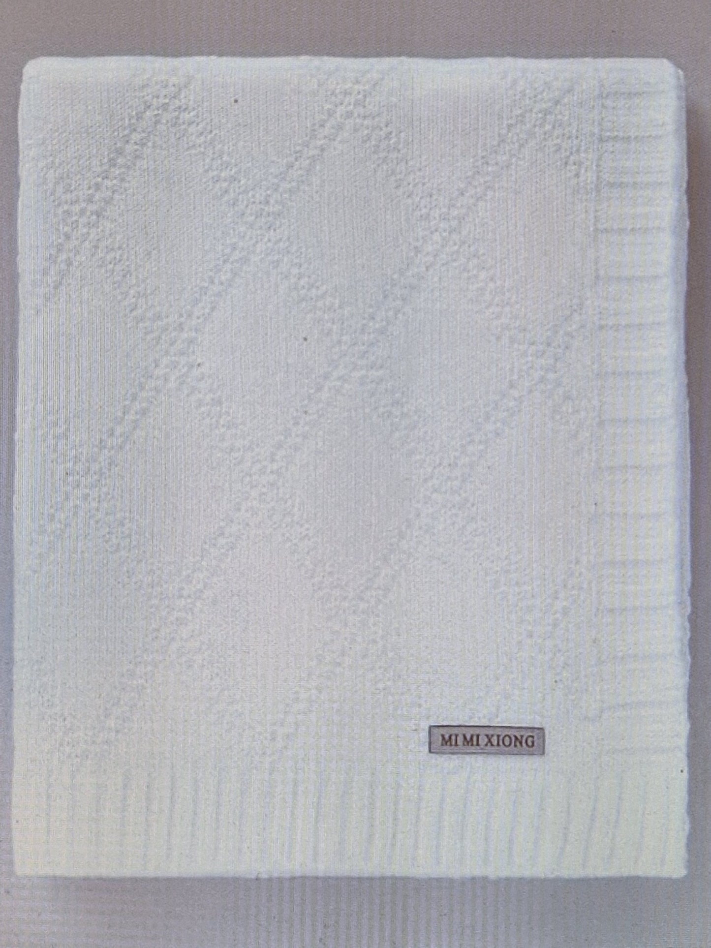 Children's rhombus knitted blanket