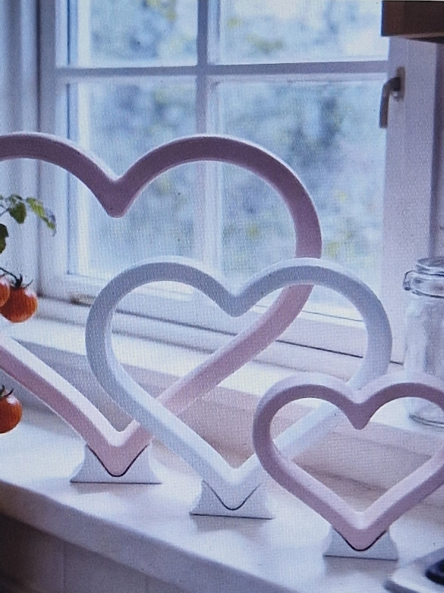 Red and white heart sculptures