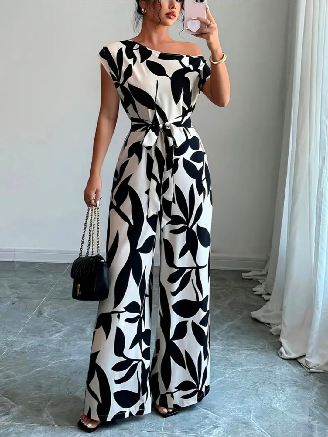 Ladies one shoulder floral jumpsuit