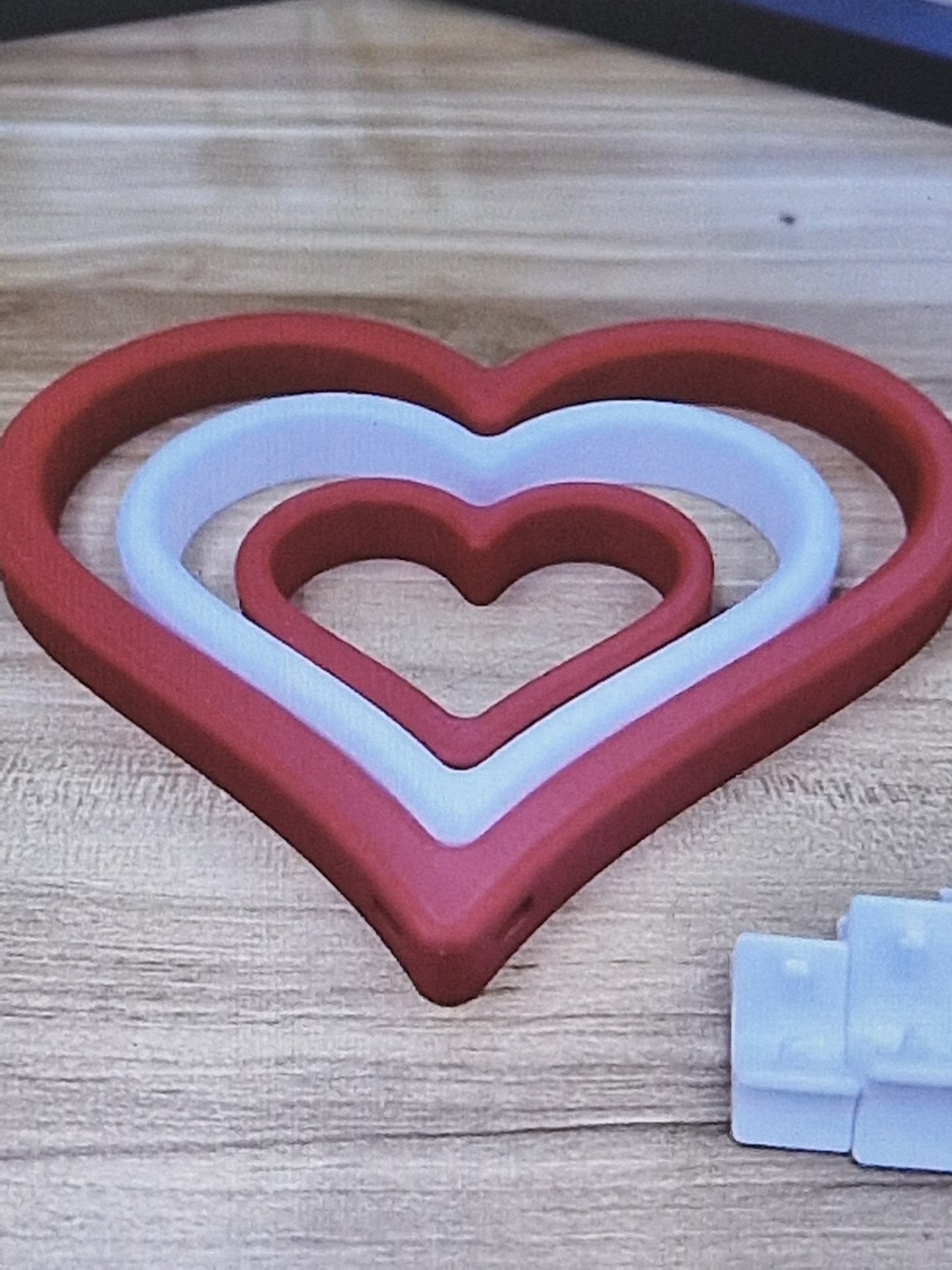 Red and white heart sculptures