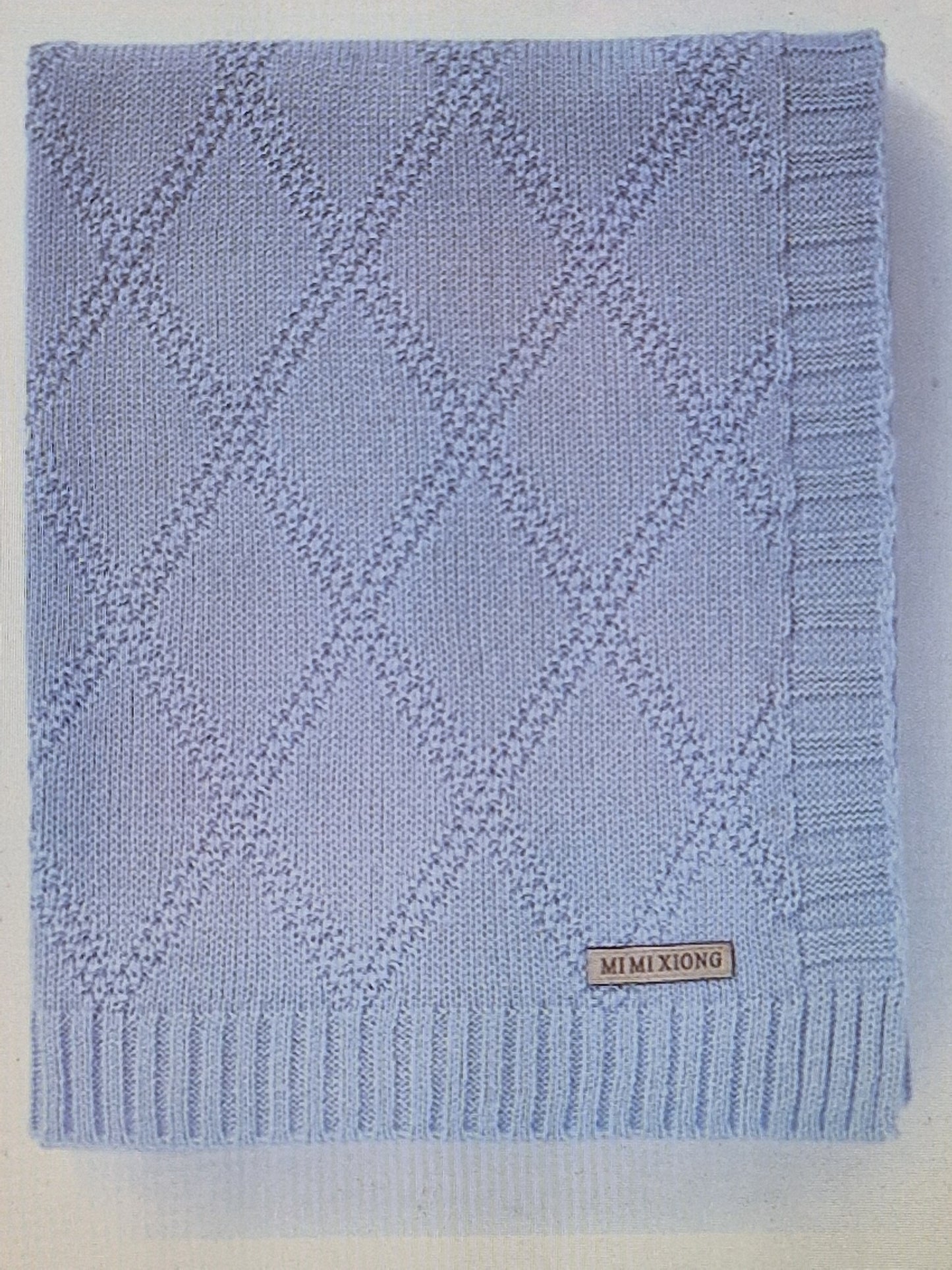 Children's rhombus knitted blanket