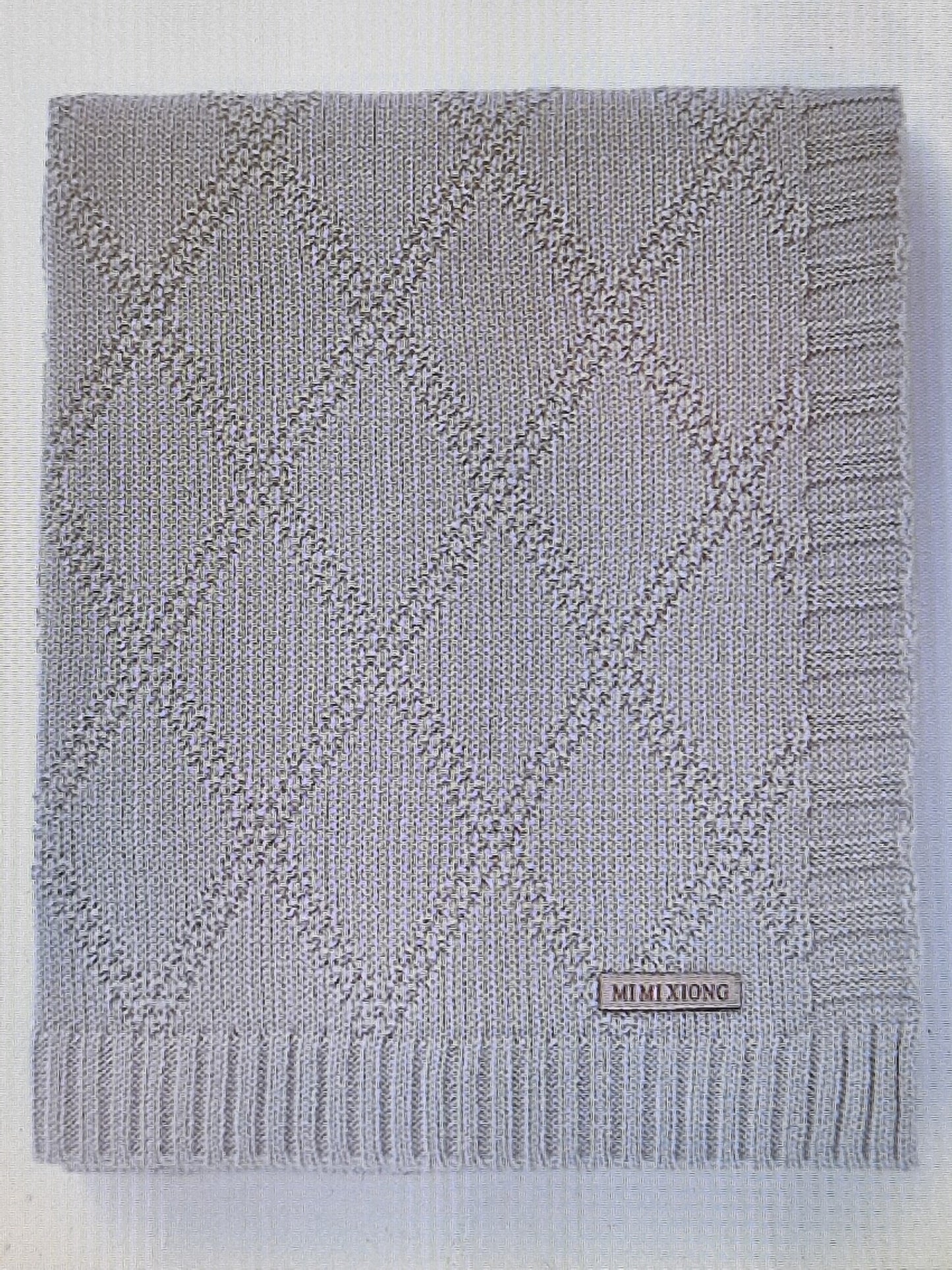 Children's rhombus knitted blanket